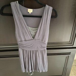 Sleeveless deep v-neck top with sparkle